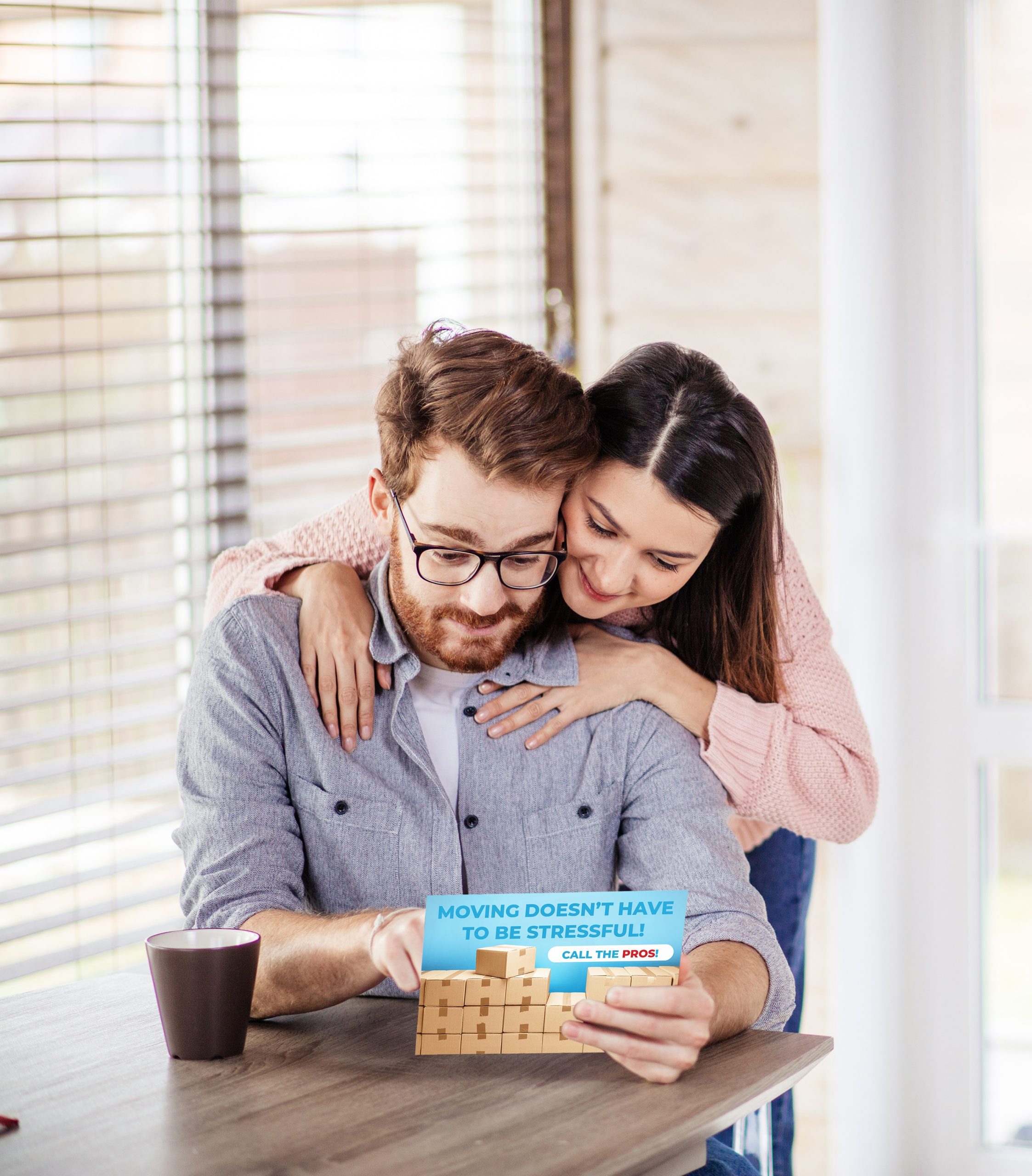 couple reading postcard