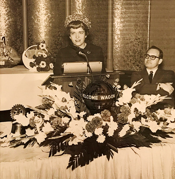 vintage photo of speaker at welcome wagon event