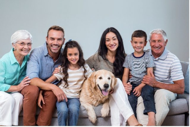 family with golden retriever