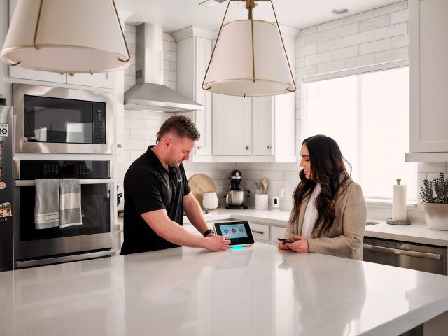 man and woman in the kitchen 